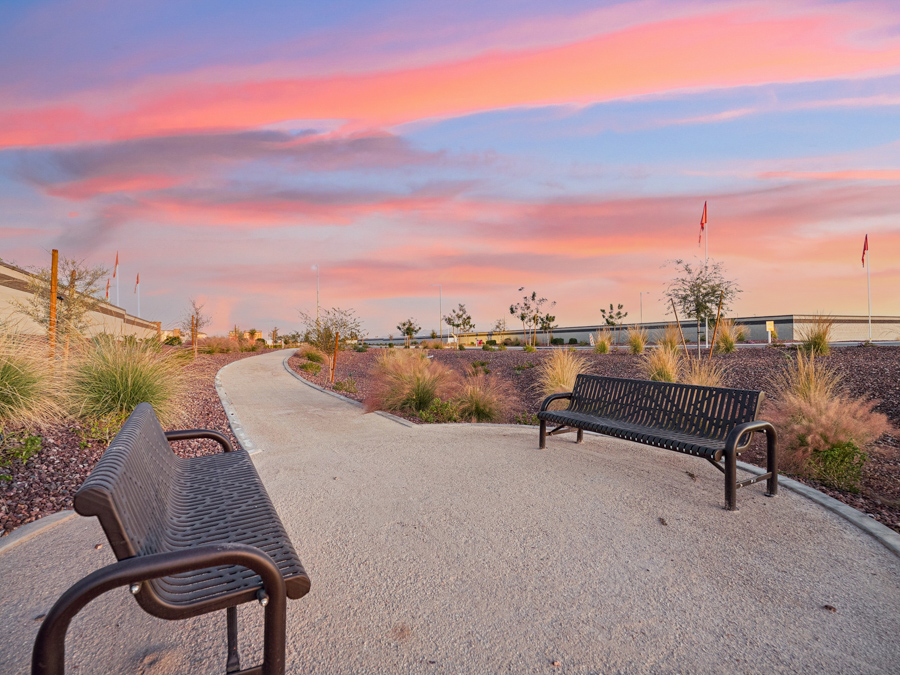 Benches on a sidewalk.