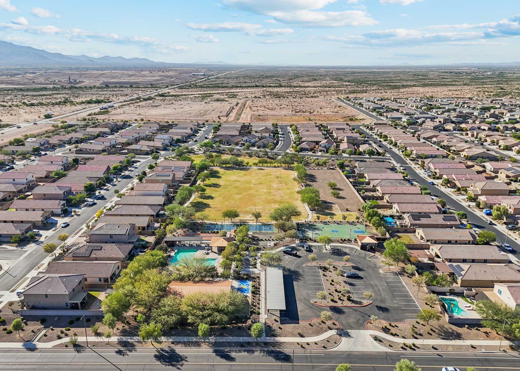 A large area with many buildings and trees.