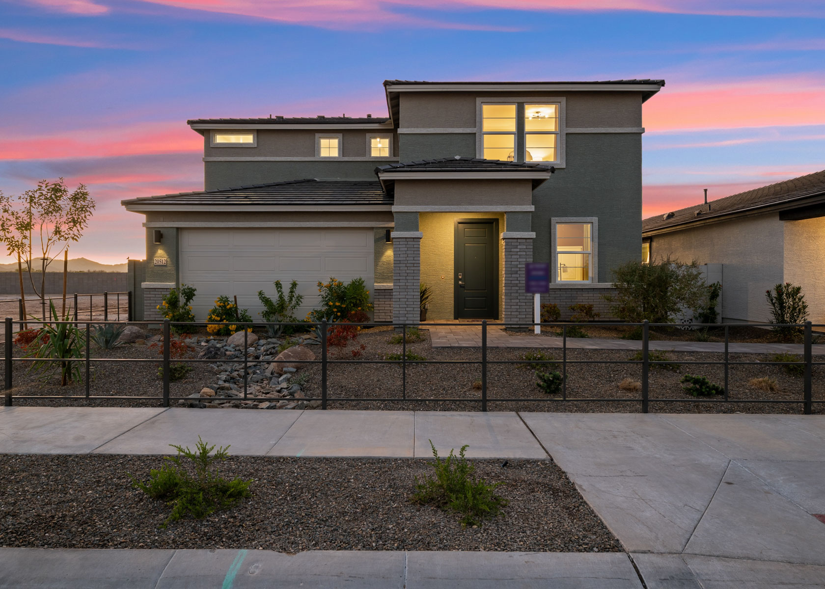 A house with a fence around it.