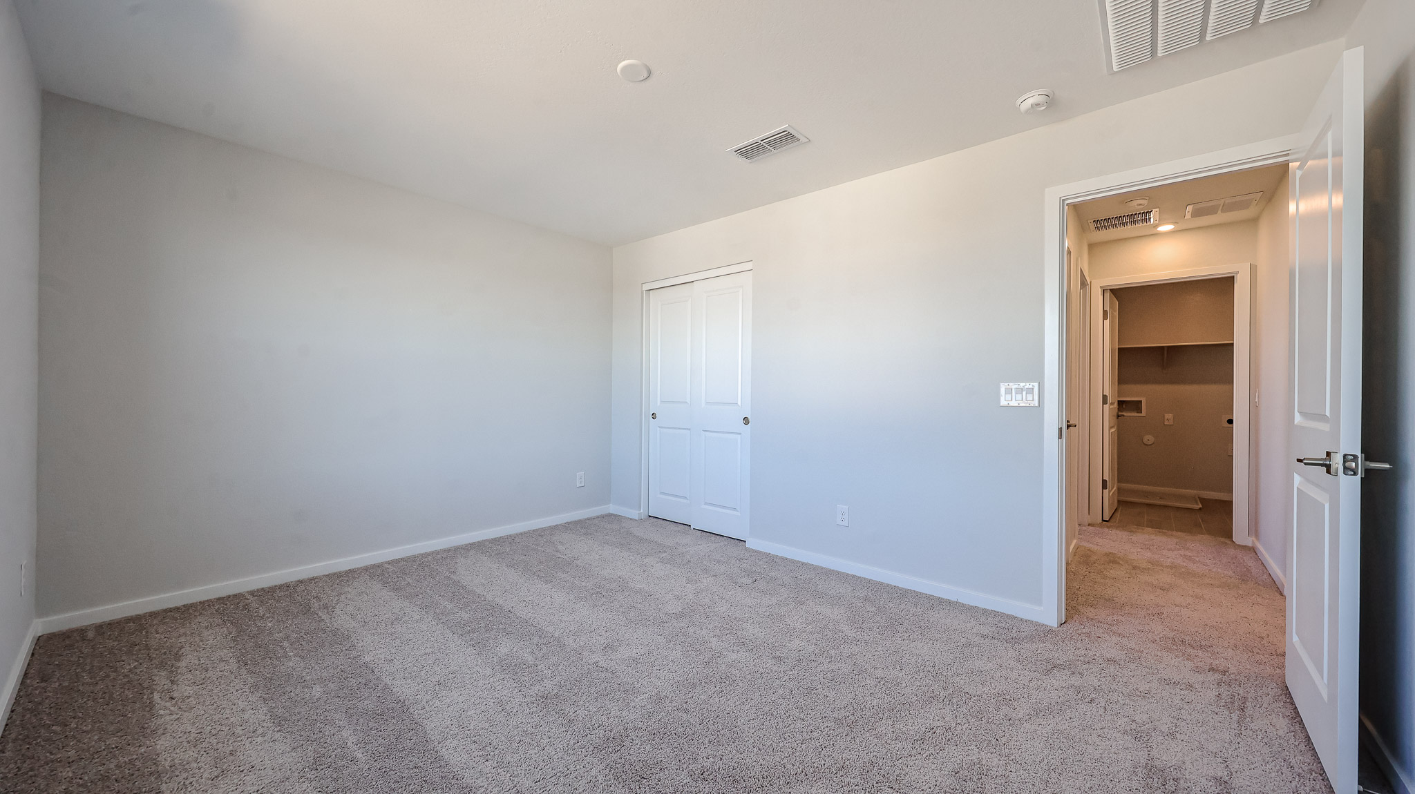 A room with white doors.