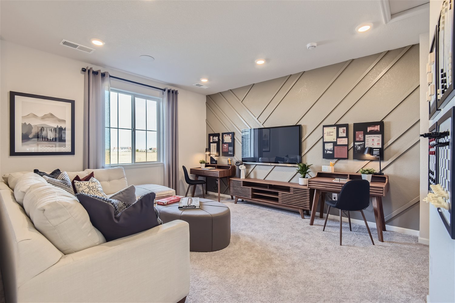 A living room with a couch and a tv.