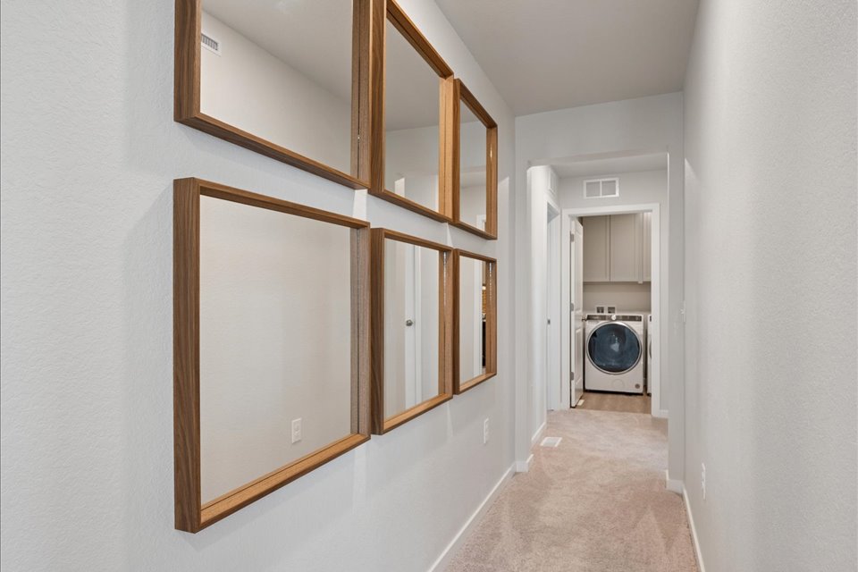 A mirror is on the wall.