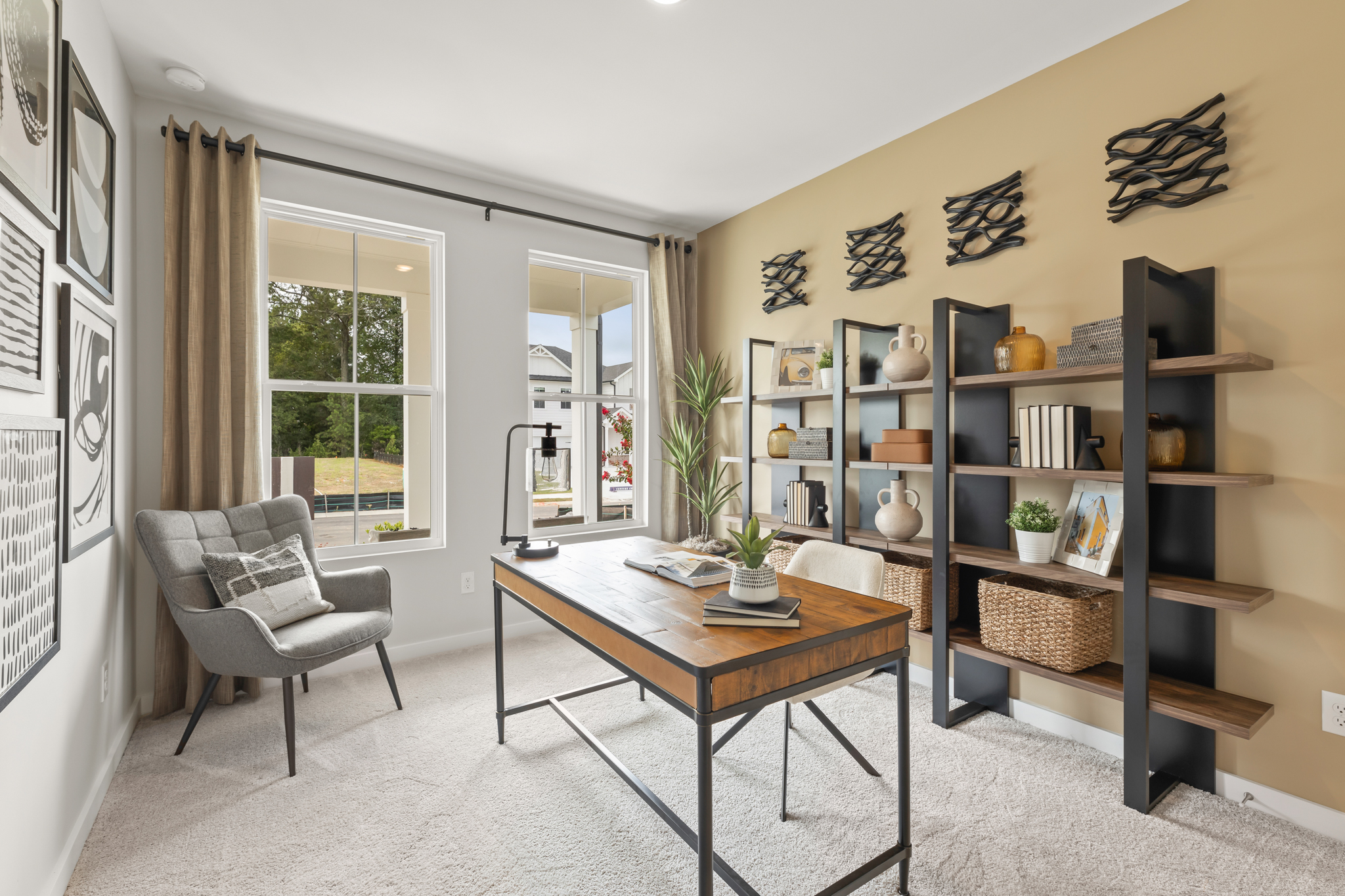 A room with a table and shelves.
