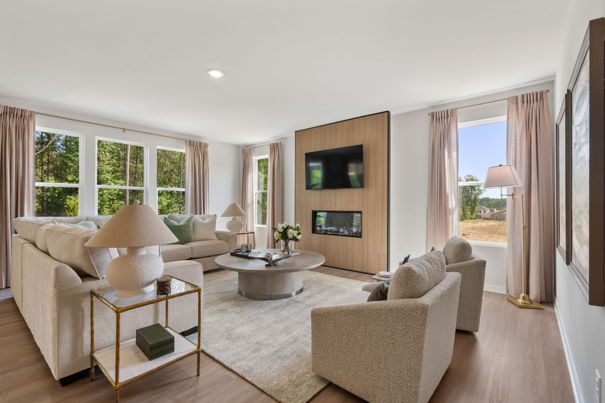 A living room with a large window.