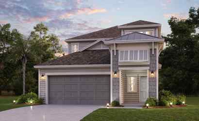 A house with a driveway and trees.