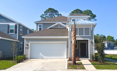 A house with a garage and a driveway.