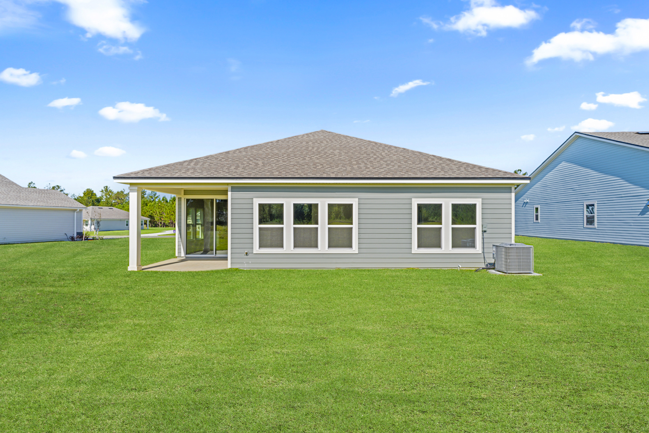 Lot 591 Rear Exterior with Covered Patio at NorthShore in Kingsland