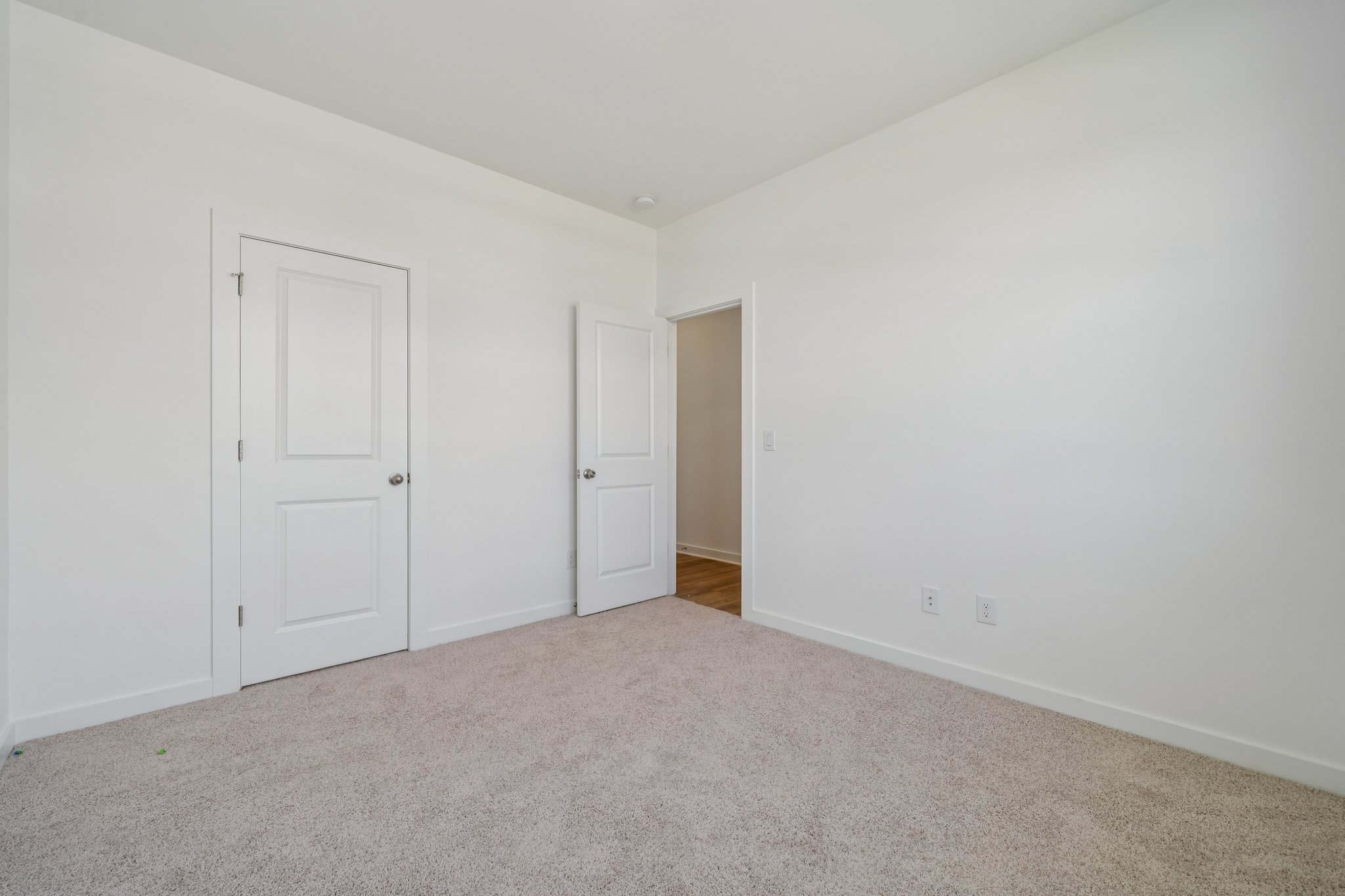 A room with white doors.