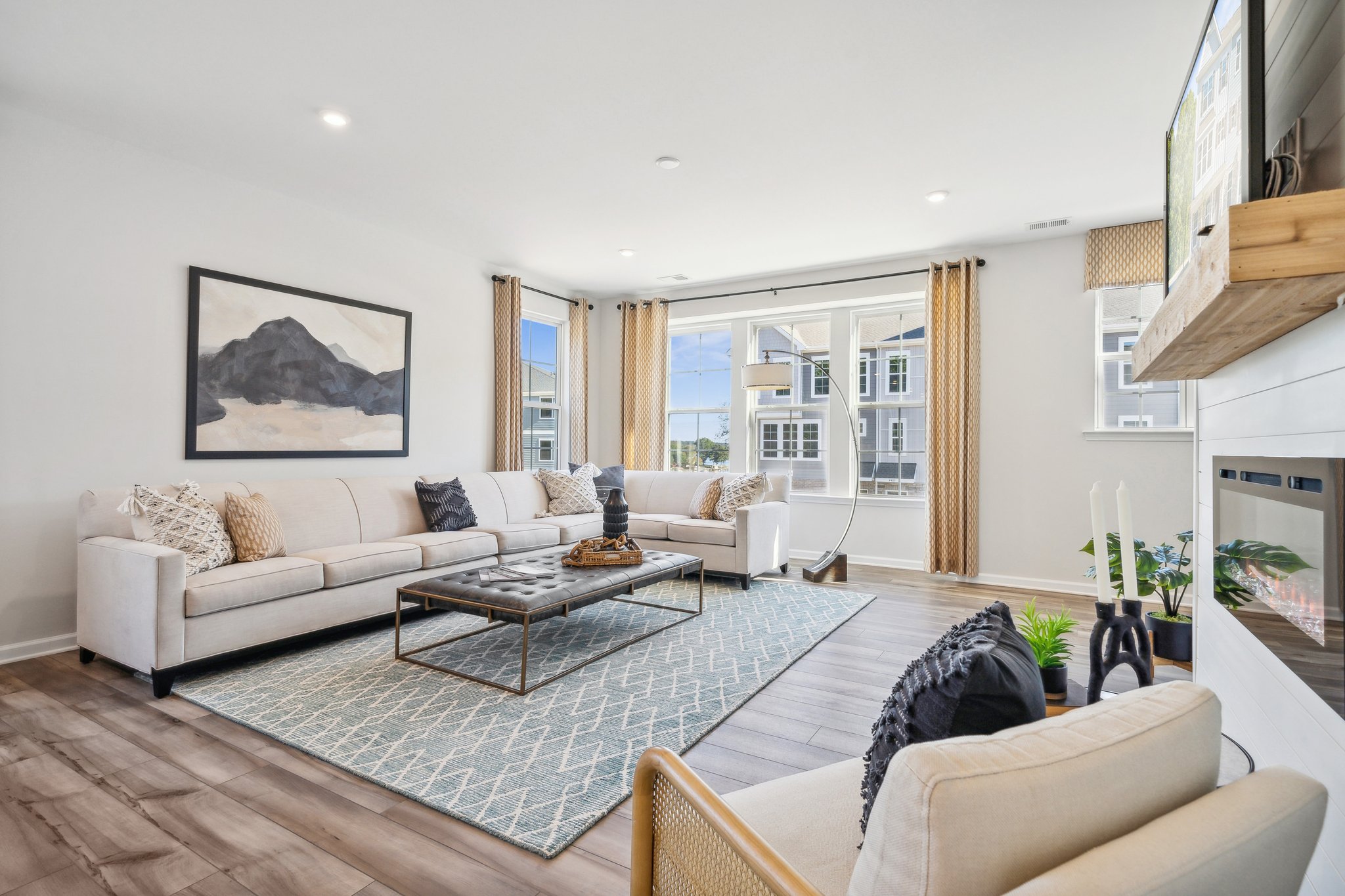 A living room with a large window.