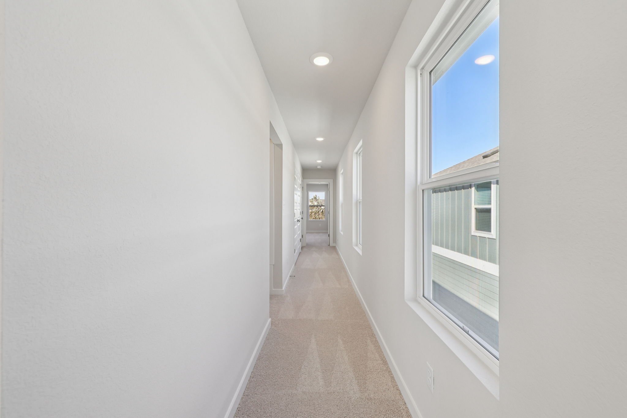 A hallway with windows.