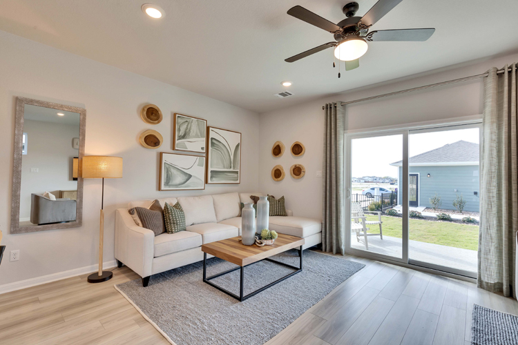 A living room with a large window.