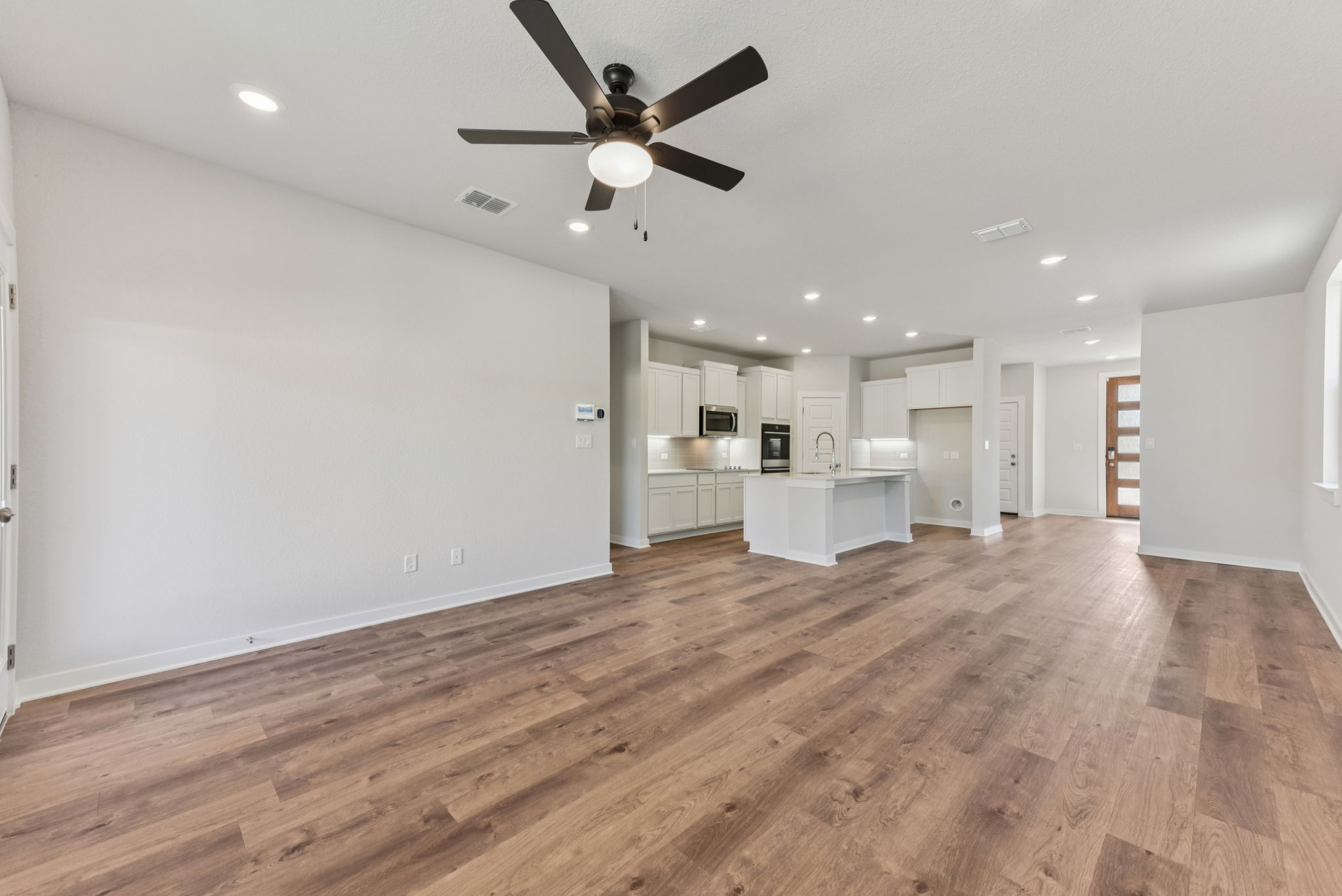 A large empty living room.