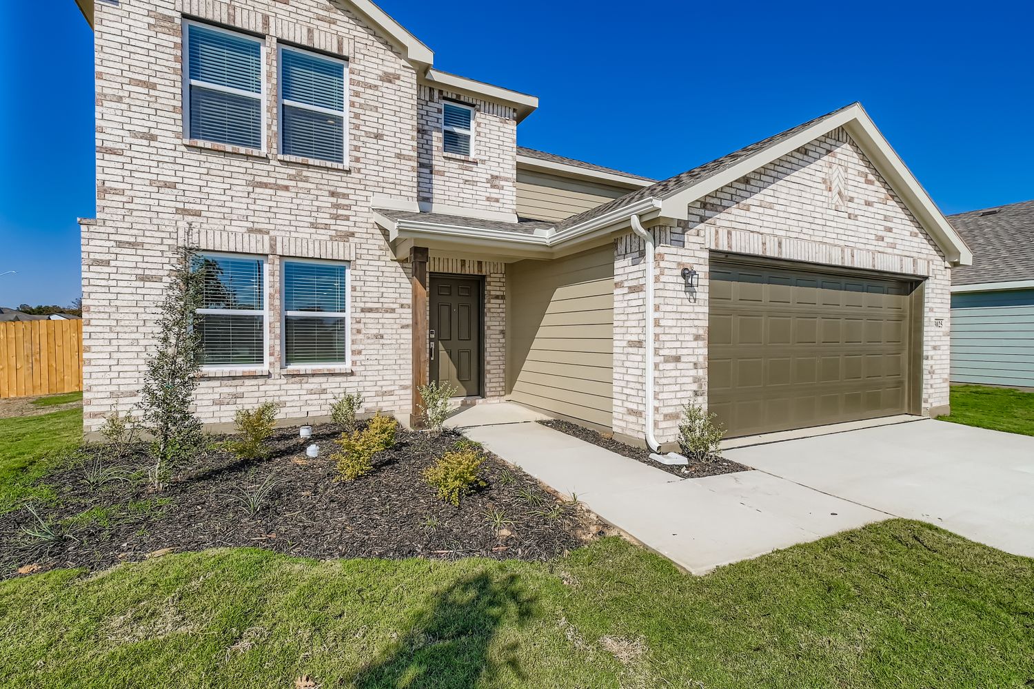 A house with a driveway.