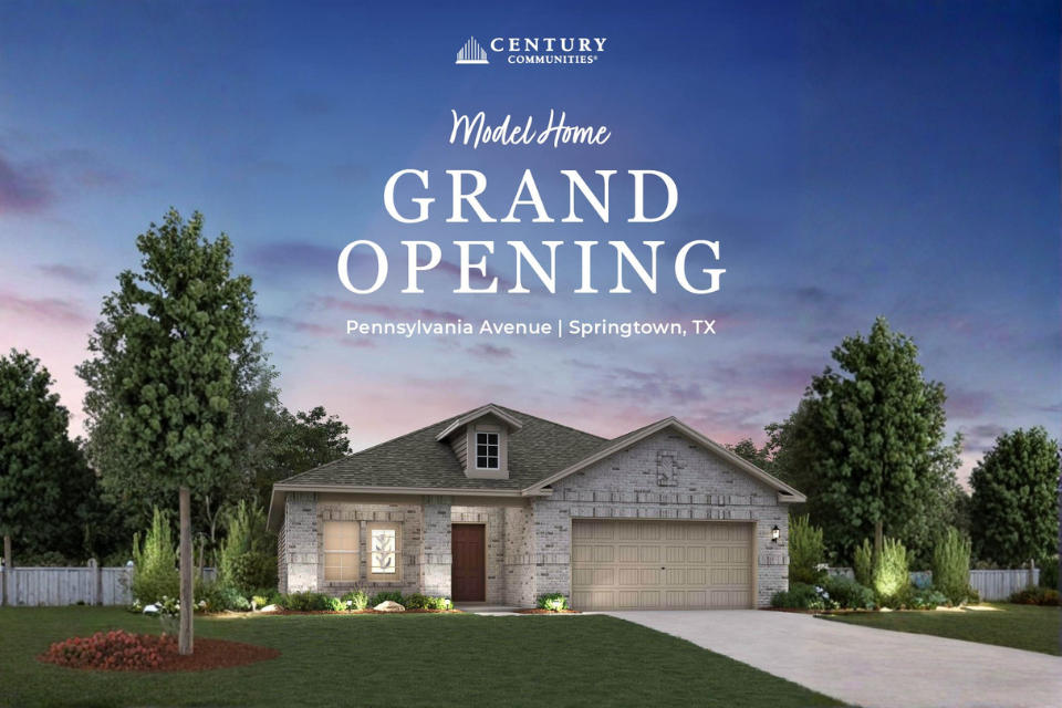 A house with a driveway and trees.