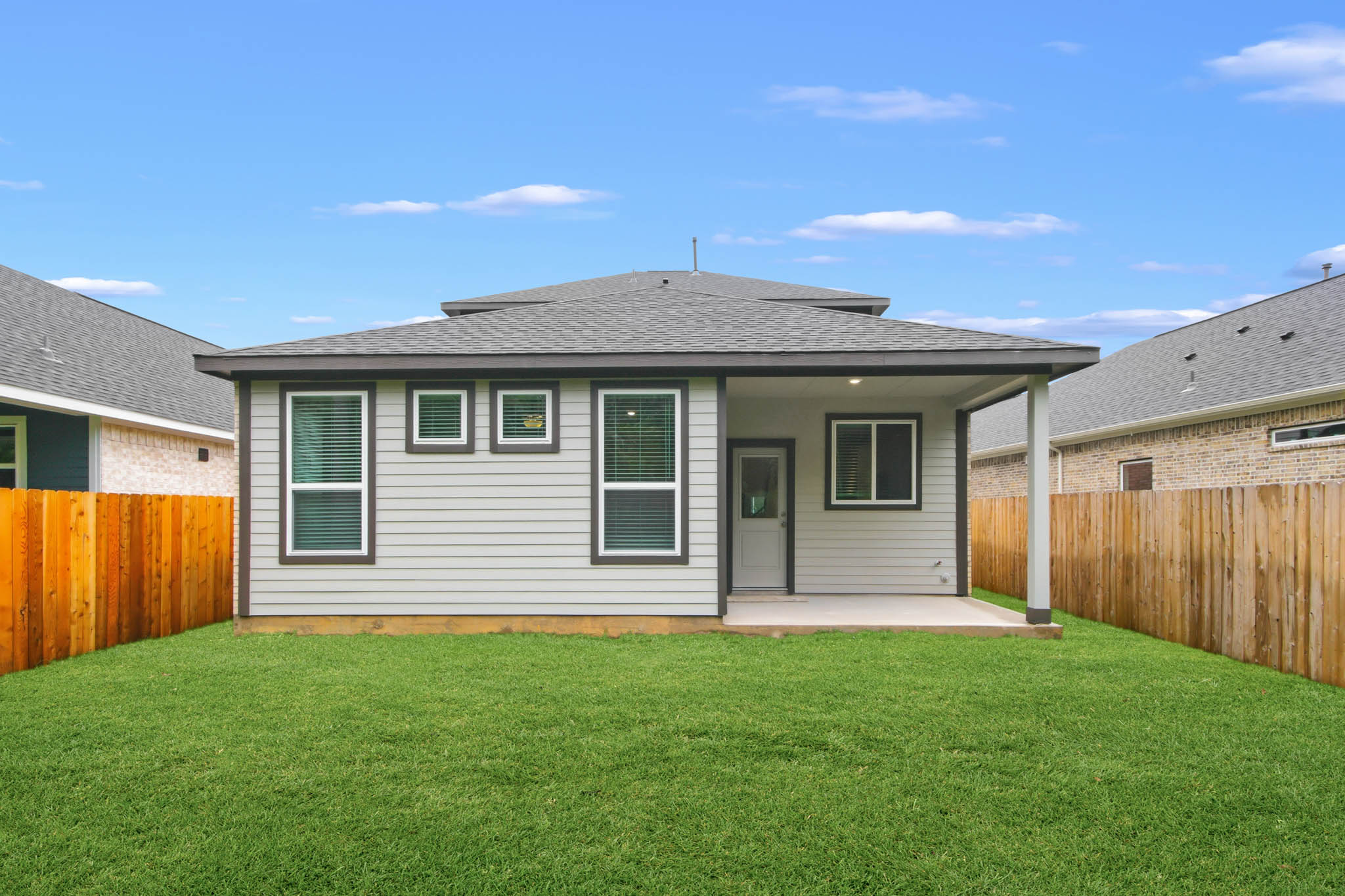 A house with a fence around it.