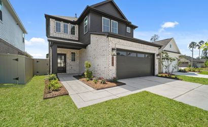 A house with a driveway.