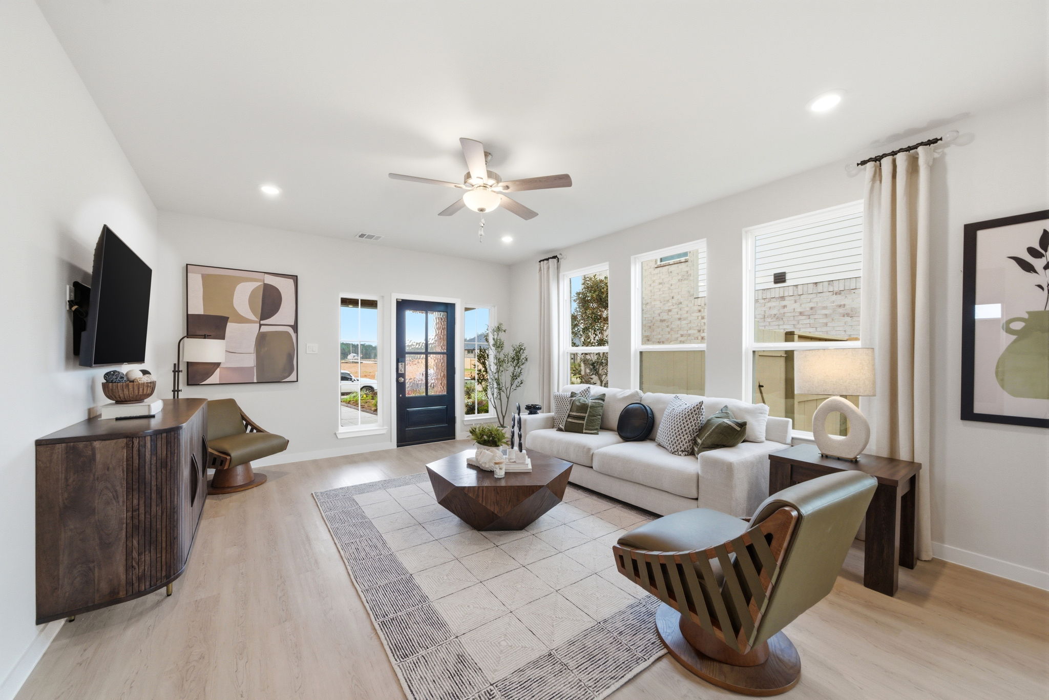 A living room with a rug and a rug.