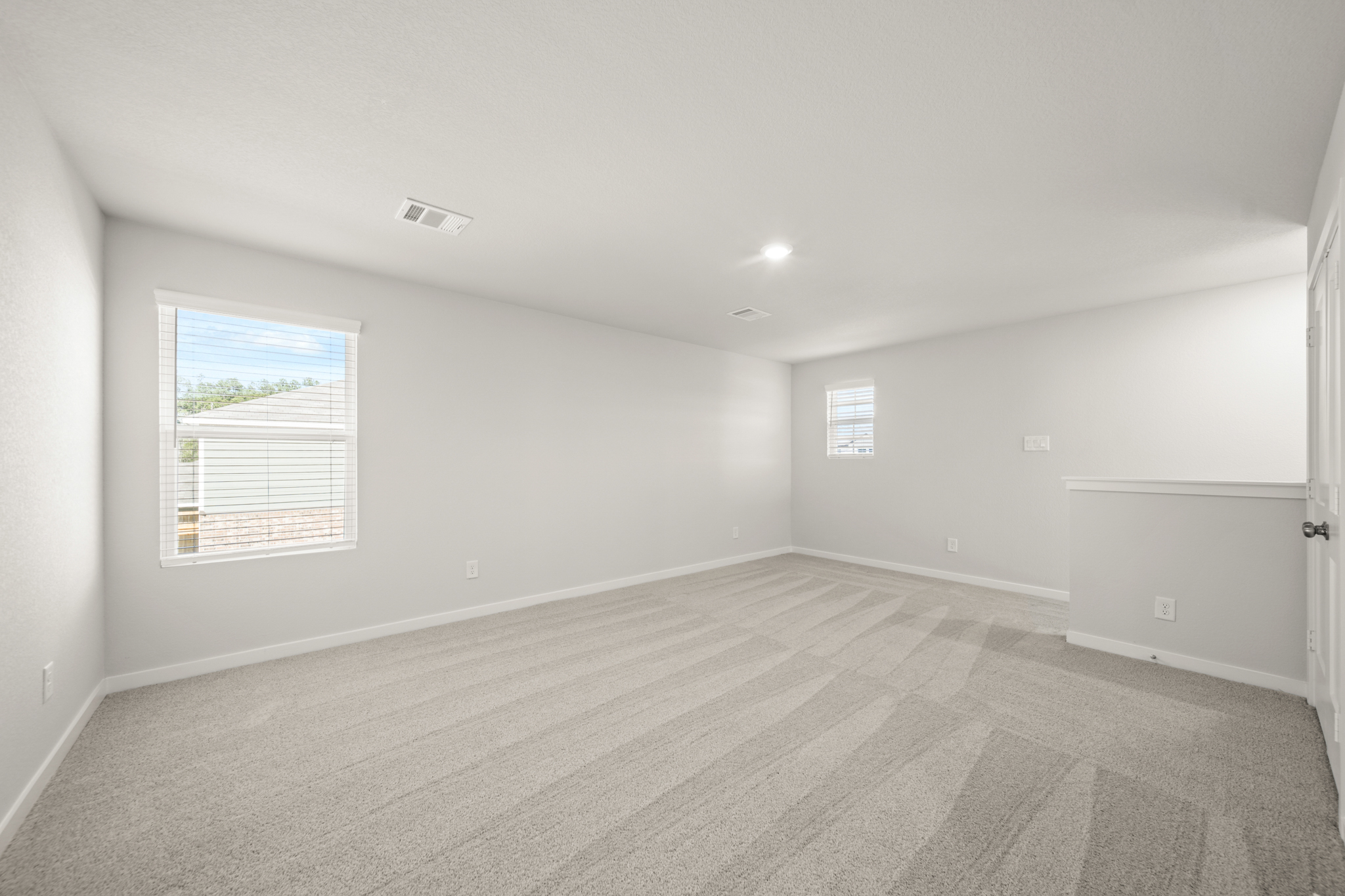 A room with a large window.