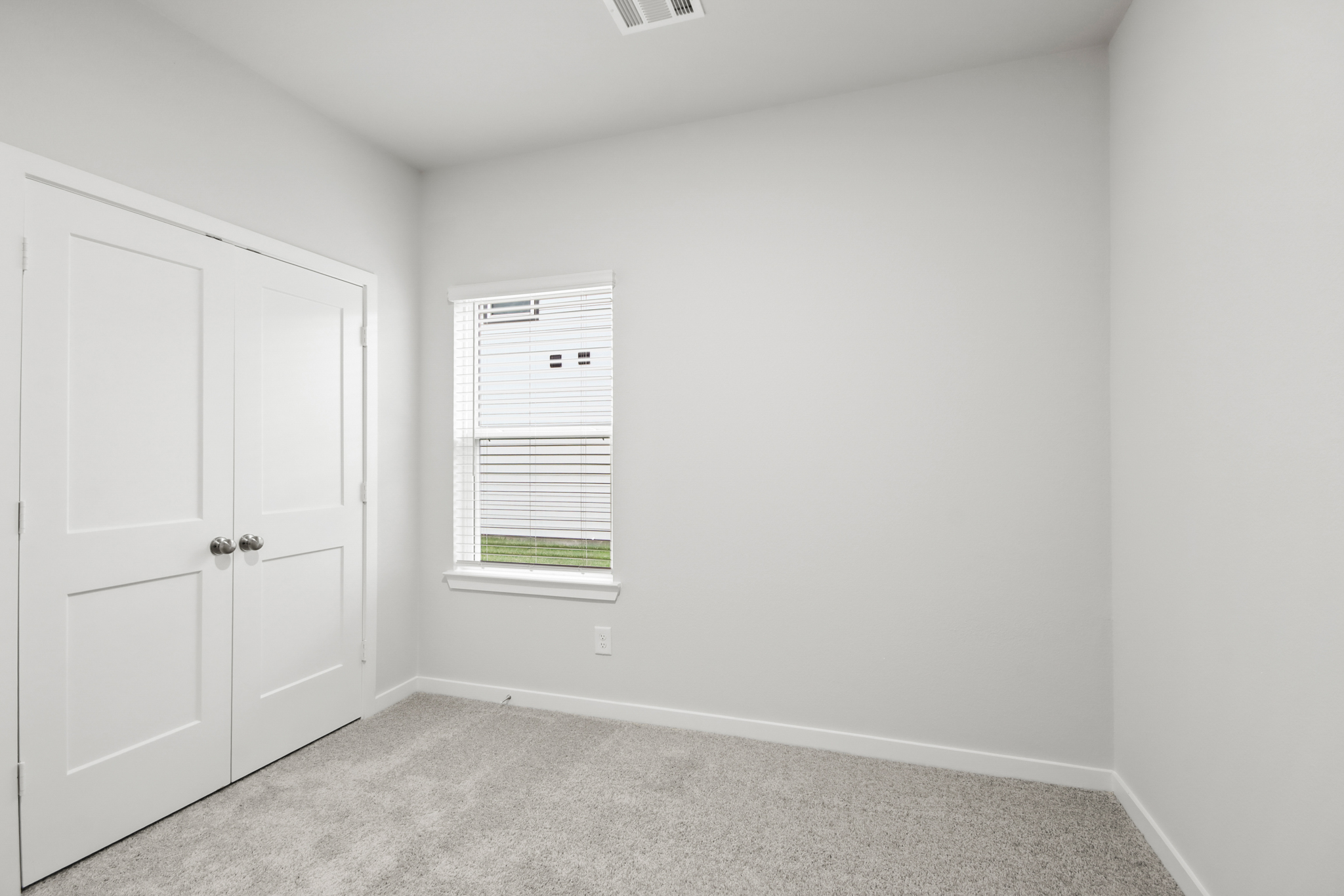 A room with white doors.