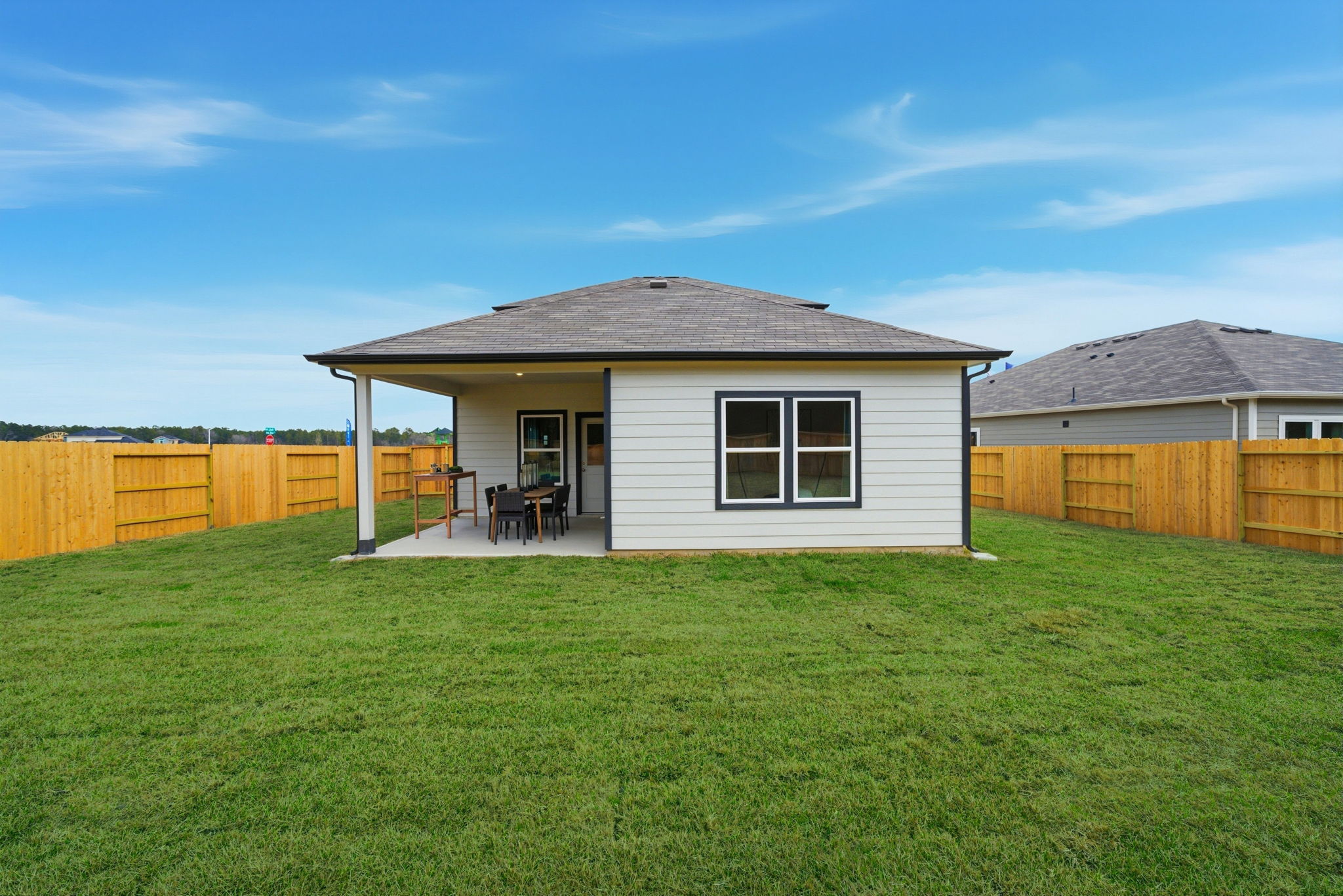 A house with a fence around it.