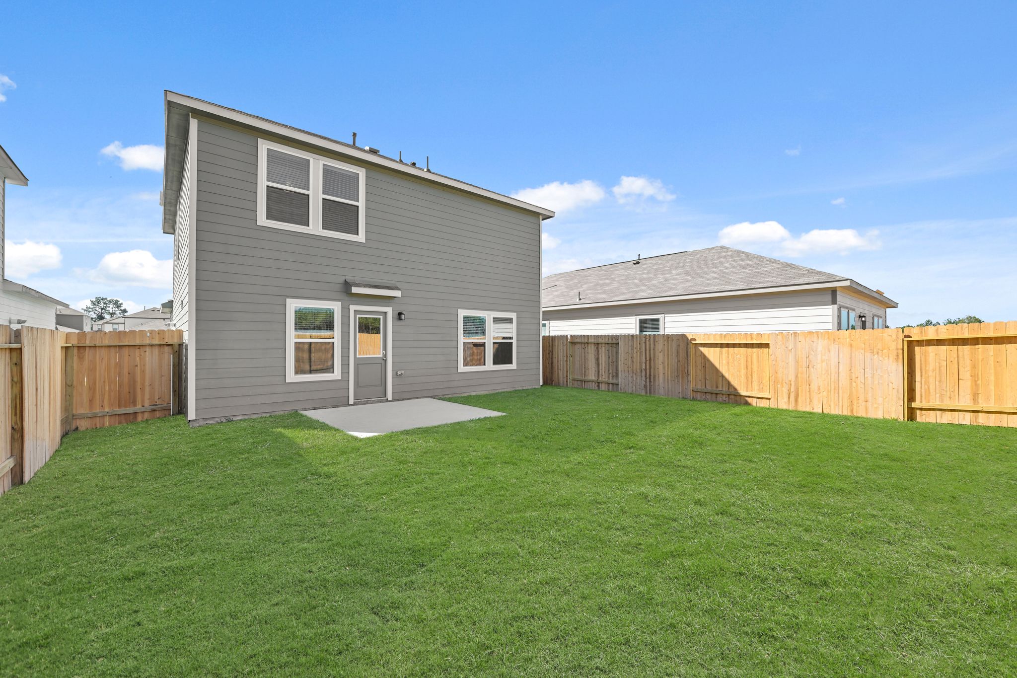 A house with a fence around it.