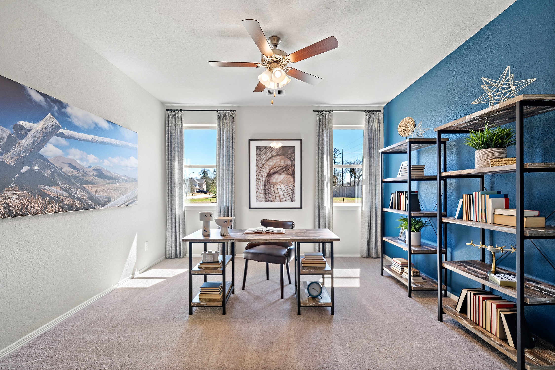 A room with a table and shelves.