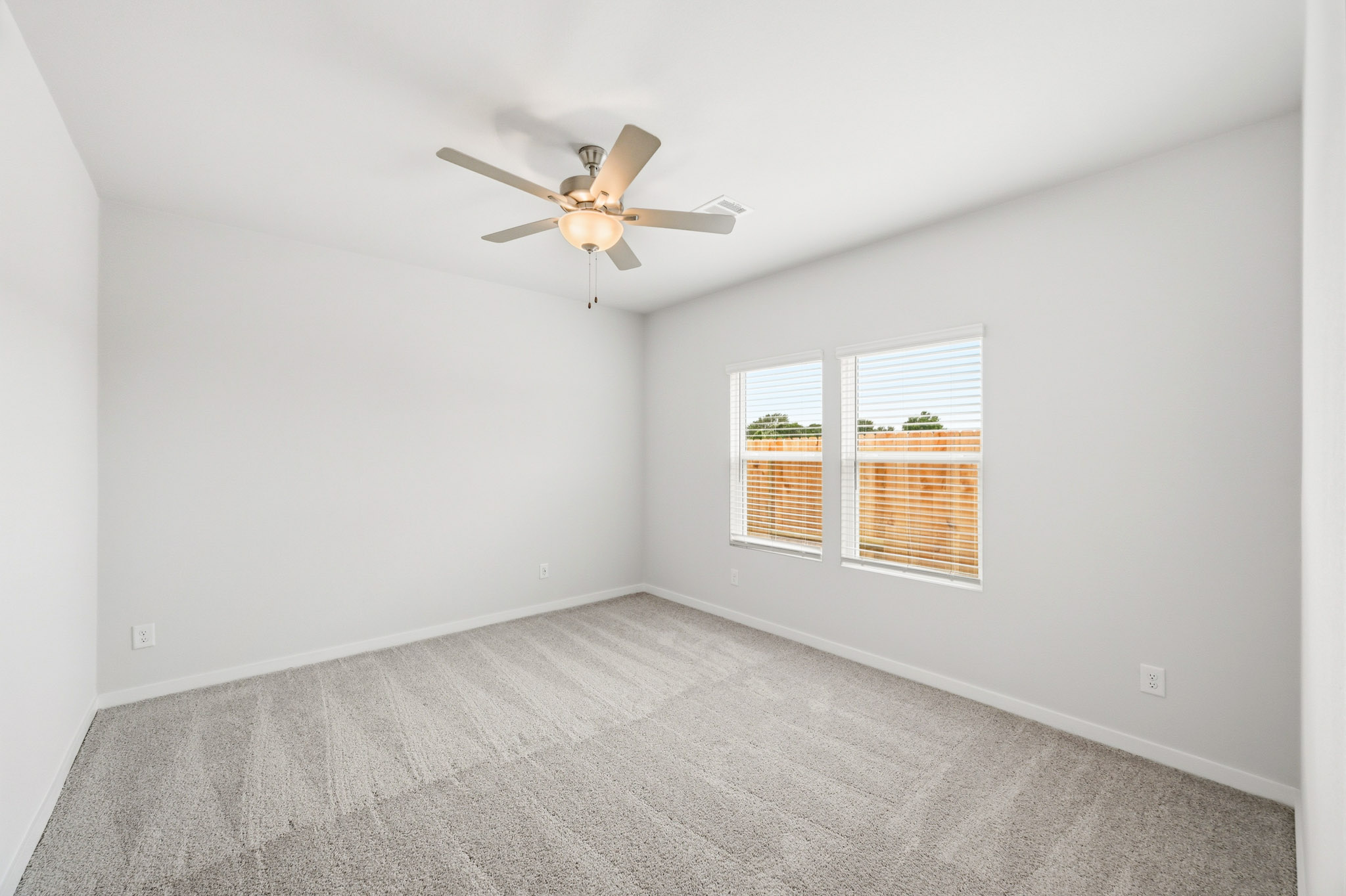 A ceiling fan in a room.