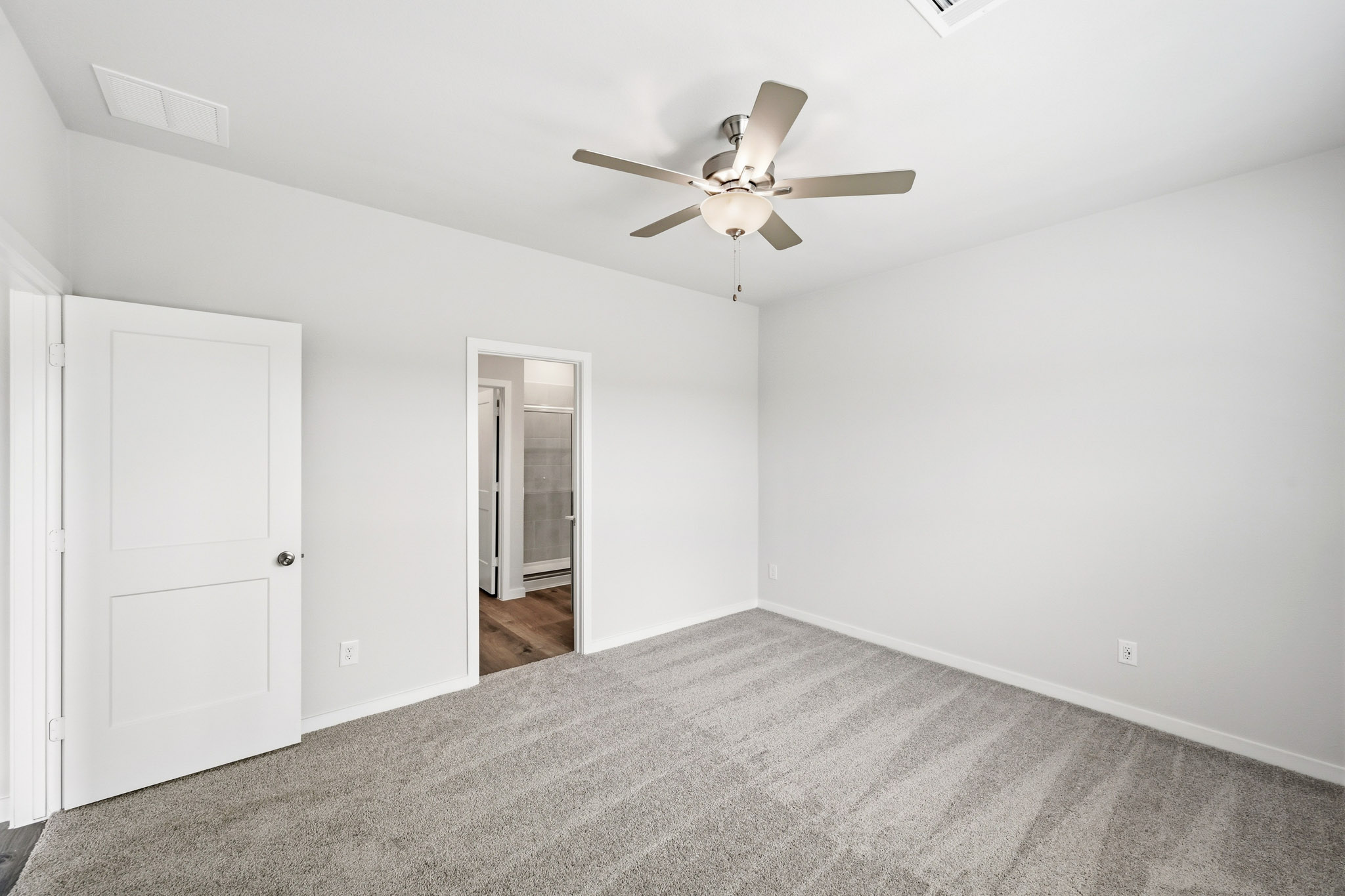 A ceiling fan in a room.