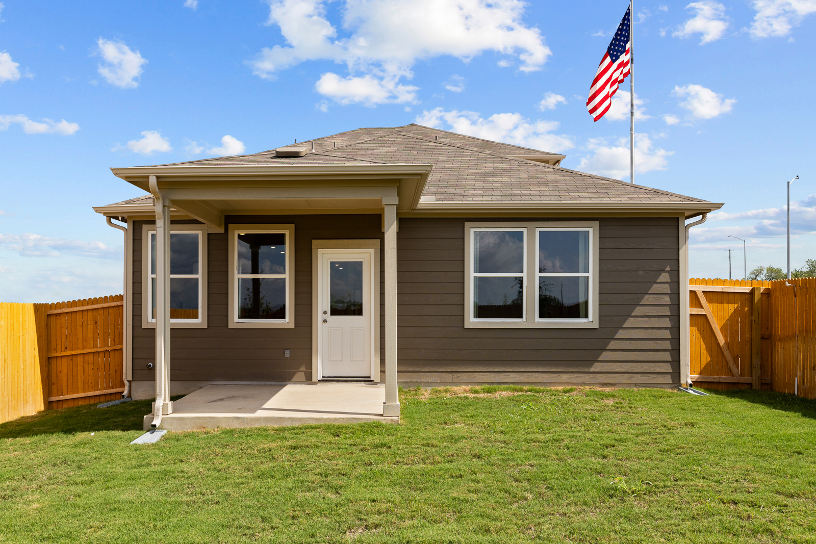 A small house with a flag on the roof.
