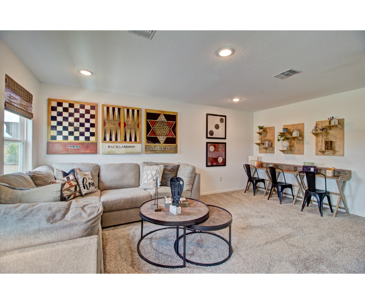 A living room with a couch and a coffee table.