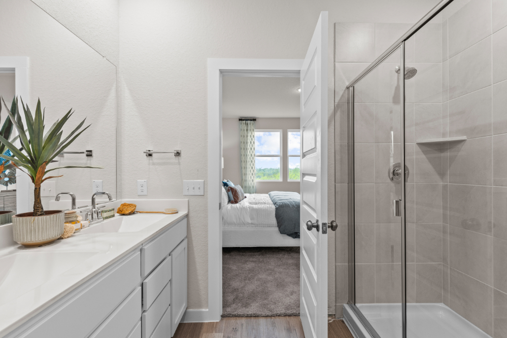 A bathroom with a glass shower.
