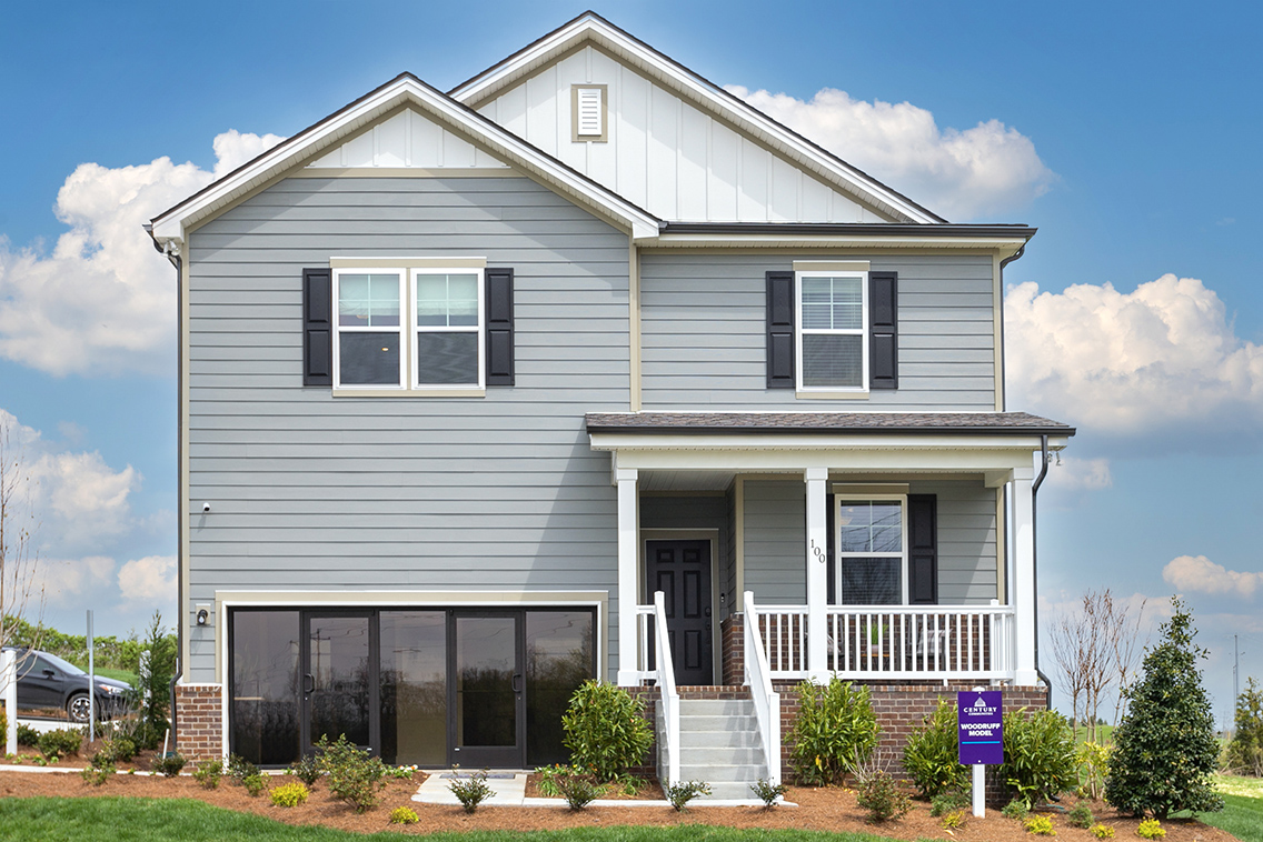 A house with a white porch.