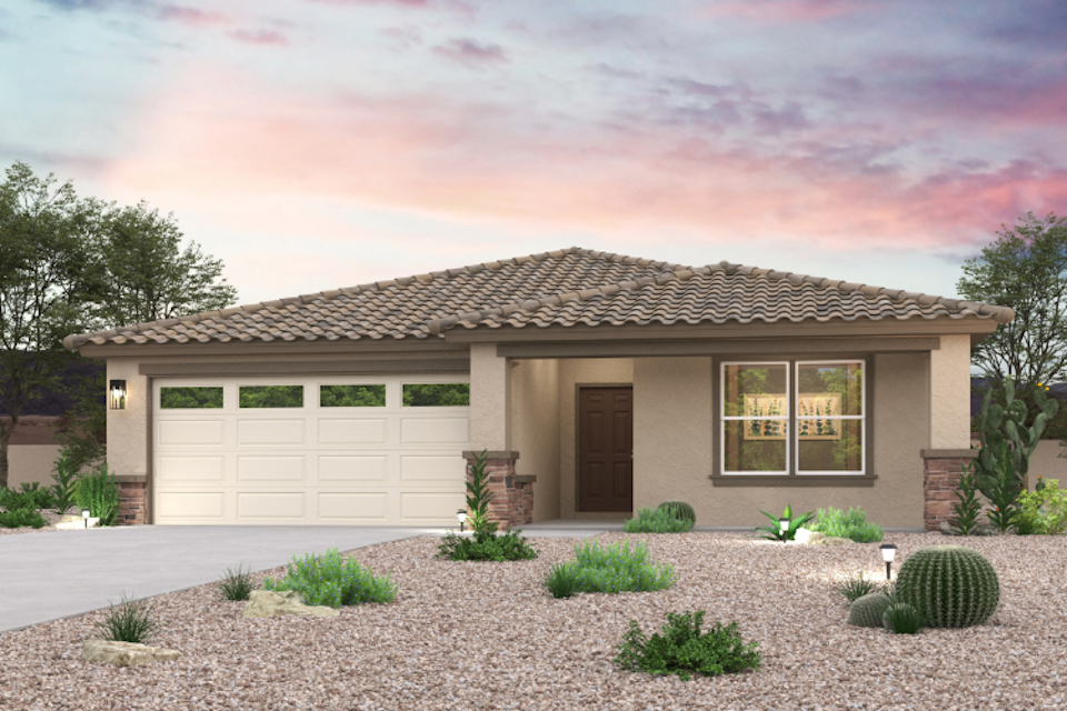 A house with a gravel driveway.