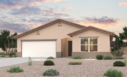 A house with a garage and bushes in front of it.