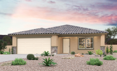 A house with a gravel driveway.