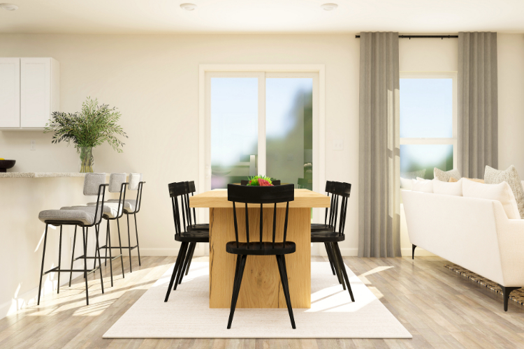 A room with a table chairs and a couch.