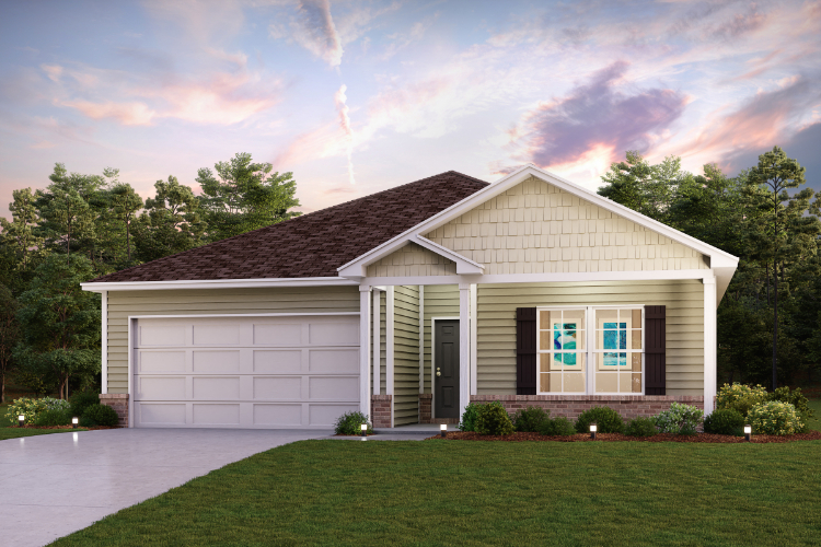 A house with a lawn in front of it.